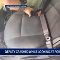 Deputy crashes car looking at porn