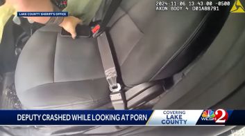 Deputy crashes car looking at porn