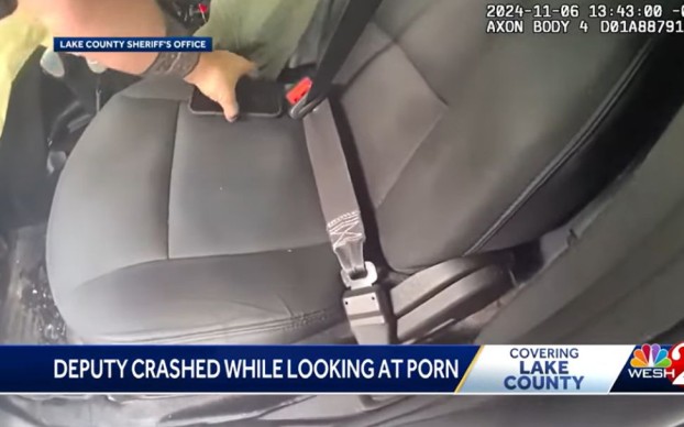 Deputy crashes car looking at porn